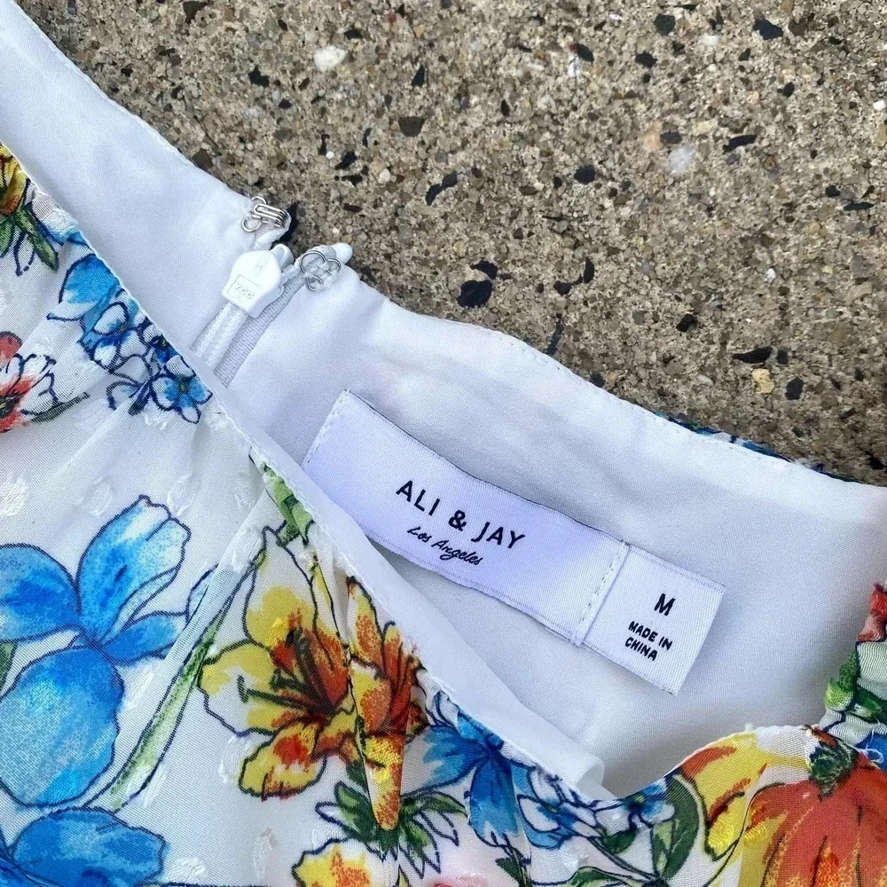 Ali & Jay The Avalon White Floral Print Ruffled Culotte Jumpsuit